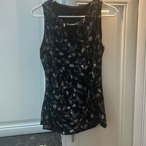 Black shell too with blue and white floral design and chain detail